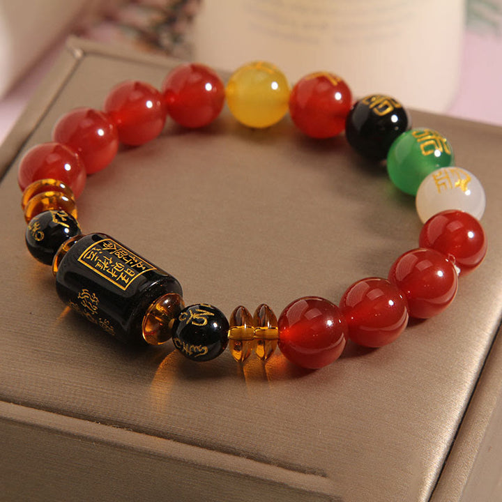 Bracelet de sagesse et de richesse en onyx noir et agate rouge avec cinq éléments de Buddha Stones