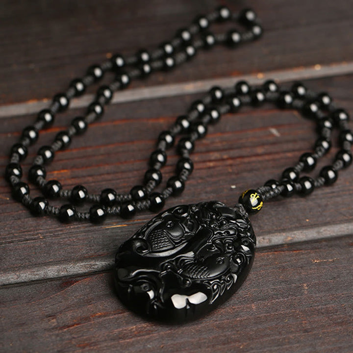 Collier pendentif en corde de perles de poisson Koi en obsidienne noire avec Buddha Stones