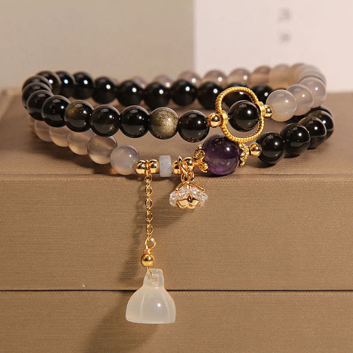 Bracelet double tour renforcé avec breloque en obsidienne grise et agate et lotus en Buddha Stones