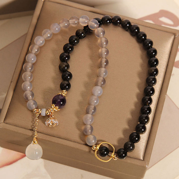 Bracelet double tour renforcé avec breloque en obsidienne grise et agate et lotus en Buddha Stones