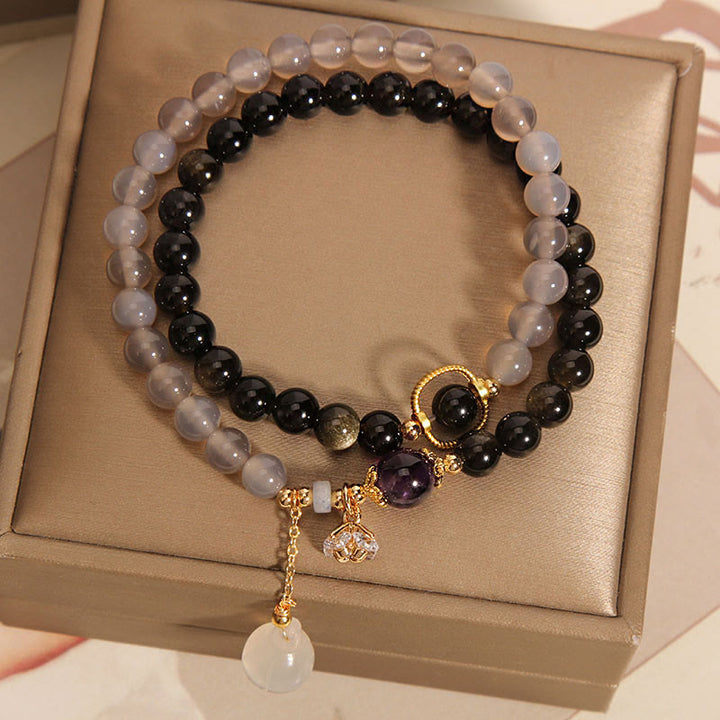Bracelet double tour renforcé avec breloque en obsidienne grise et agate et lotus en Buddha Stones