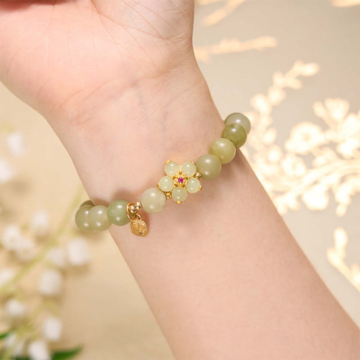 Bracelet porte-bonheur avec breloque en jade vert et fleur de Buddha Stones - image 4