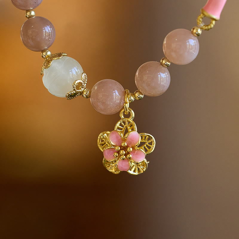 Bracelet de richesse avec breloque en forme de fleur de jade et de soie dorée en pierre naturelle de Buddha Stones