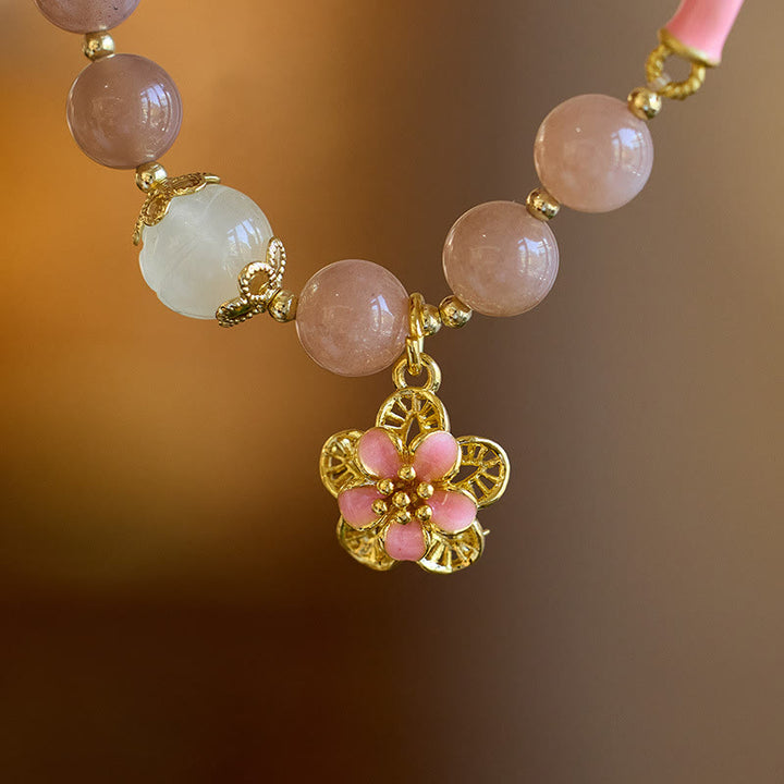 Bracelet de richesse avec breloque en forme de fleur de jade et de soie dorée en pierre naturelle de Buddha Stones
