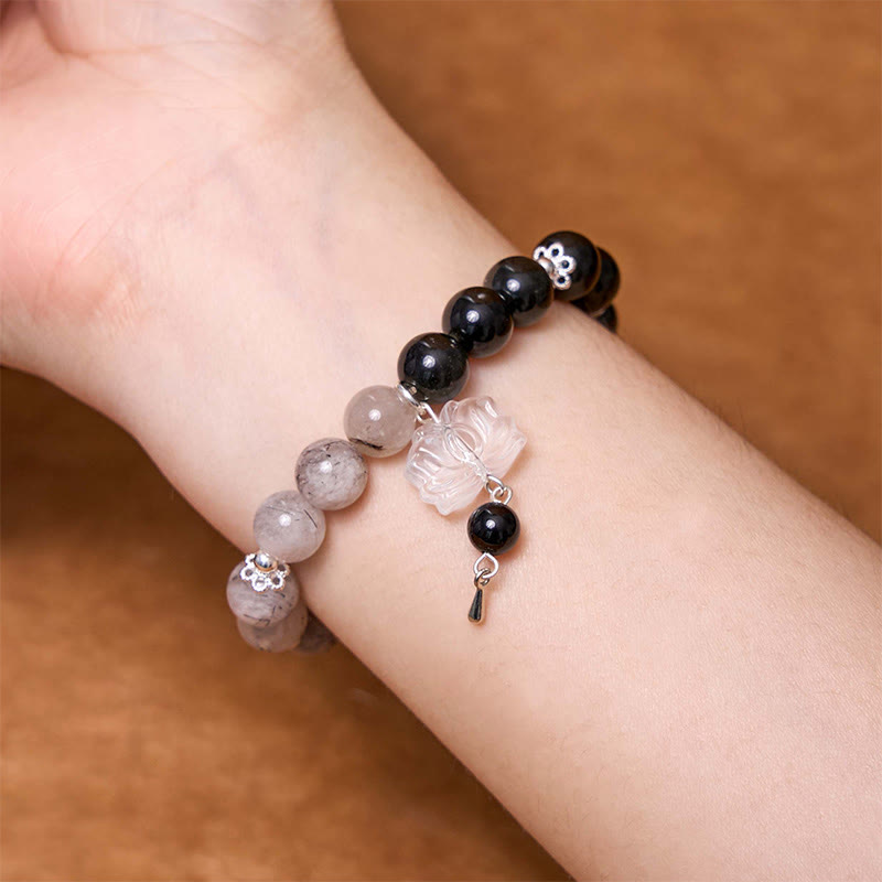 Bracelet de protection Yin Yang Lotus en quartz transparent craquelé et obsidienne argentée et brillante de Buddha Stones