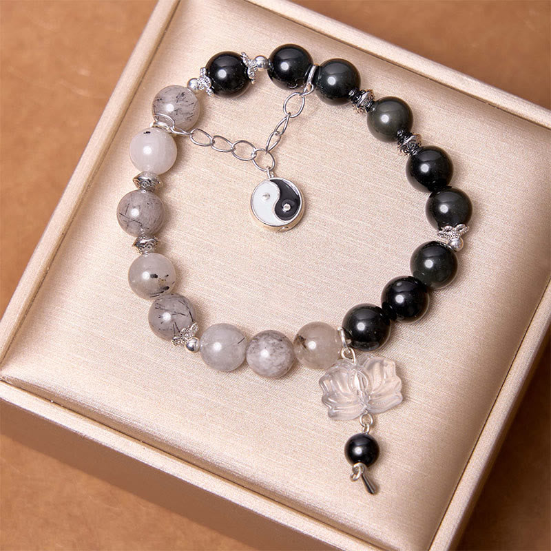 Bracelet de protection Yin Yang Lotus en quartz transparent craquelé et obsidienne argentée et brillante de Buddha Stones