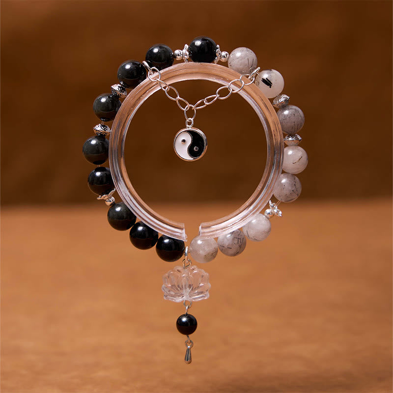 Bracelet de protection Yin Yang Lotus en quartz transparent craquelé et obsidienne argentée et brillante de Buddha Stones