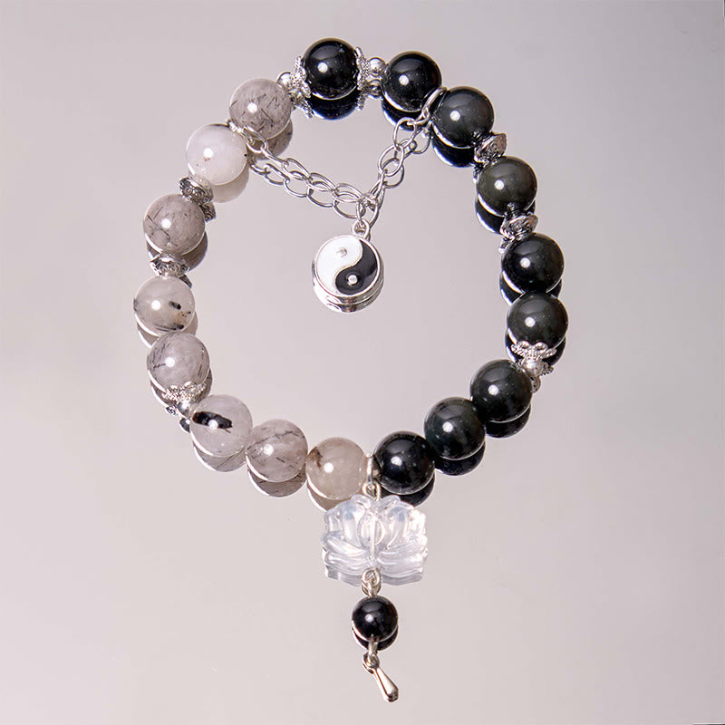 Bracelet de protection Yin Yang Lotus en quartz transparent craquelé et obsidienne argentée et brillante de Buddha Stones