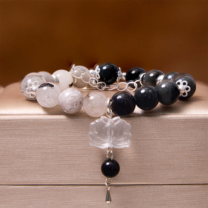 Bracelet de protection Yin Yang Lotus en quartz transparent craquelé et obsidienne argentée et brillante de Buddha Stones