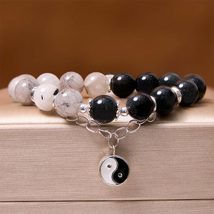 Bracelet de protection Yin Yang Lotus en quartz transparent craquelé et obsidienne argentée et brillante de Buddha Stones