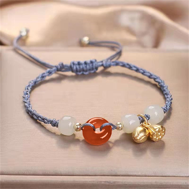Bracelet tressé de guérison en jade et lotus avec boucle de paix en agate rouge et Buddha Stones