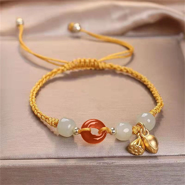 Bracelet tressé de guérison en jade et lotus avec boucle de paix en agate rouge et Buddha Stones