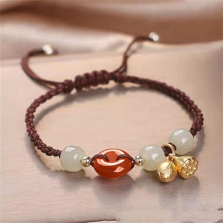 Bracelet tressé de guérison en jade et lotus avec boucle de paix en agate rouge et Buddha Stones