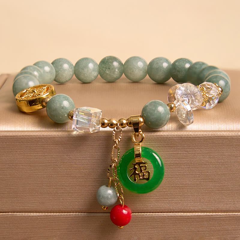 Bracelet de guérison à breloques en jade et quartz fraise Buddha Stones