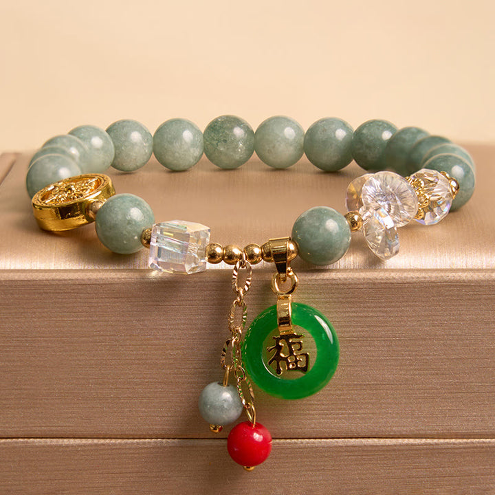 Bracelet de guérison à breloques en jade et quartz fraise Buddha Stones