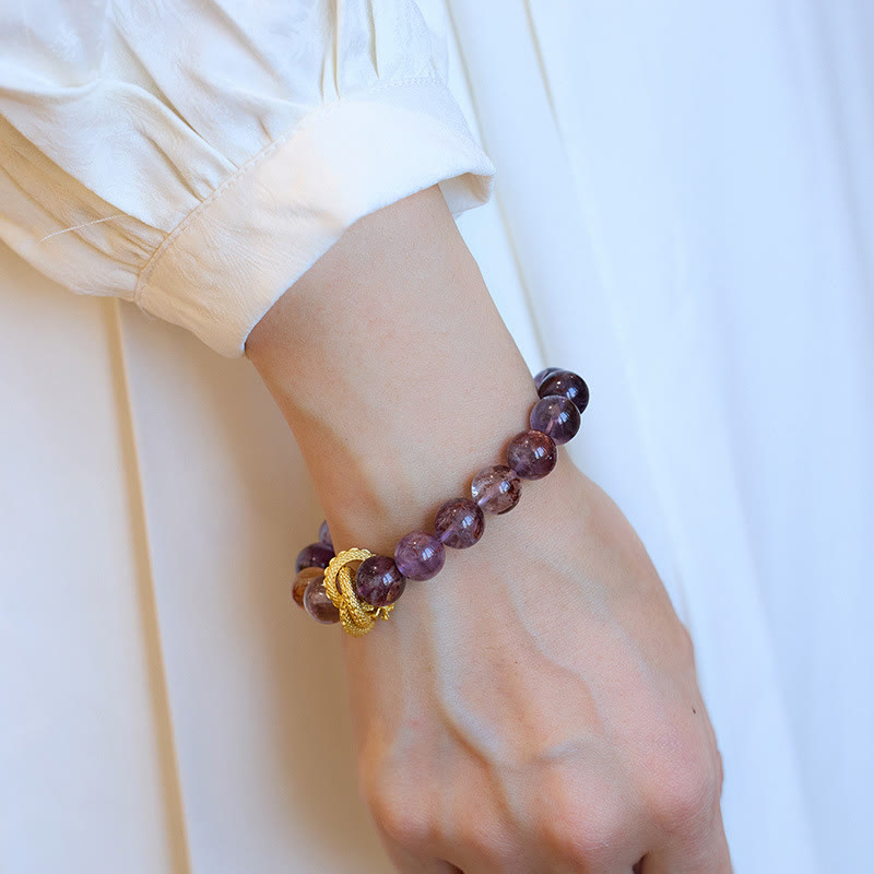 Bracelet de sagesse dragon plaqué or en cuivre fantôme violet Buddha Stones