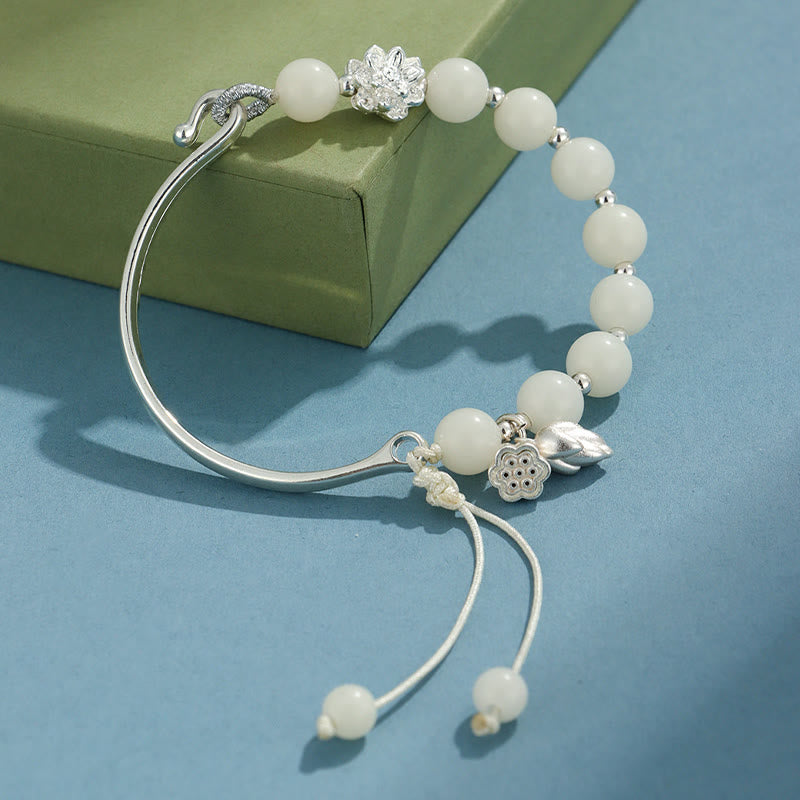 Bracelet jonc porte-bonheur en pierres de Buddha Stones et graines de Bodhi, papillon, lotus