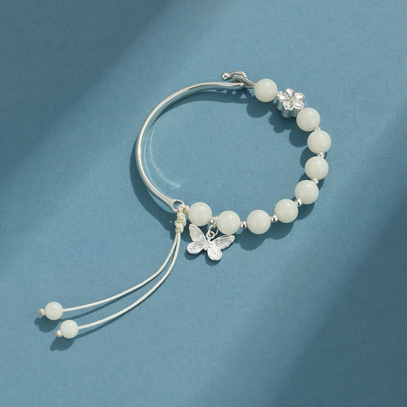 Bracelet jonc porte-bonheur en pierres de Buddha Stones et graines de Bodhi, papillon, lotus