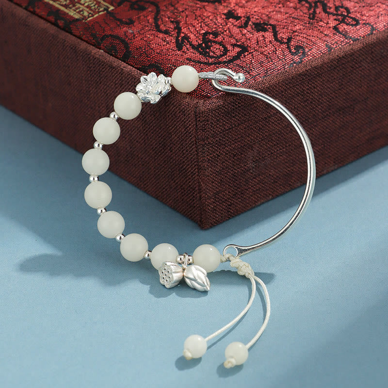 Bracelet jonc porte-bonheur en pierres de Buddha Stones et graines de Bodhi, papillon, lotus