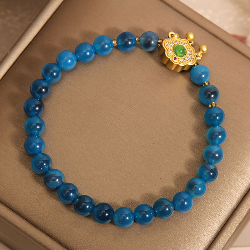 Bracelet de guérison à breloques en agate bleue Buddha Stones