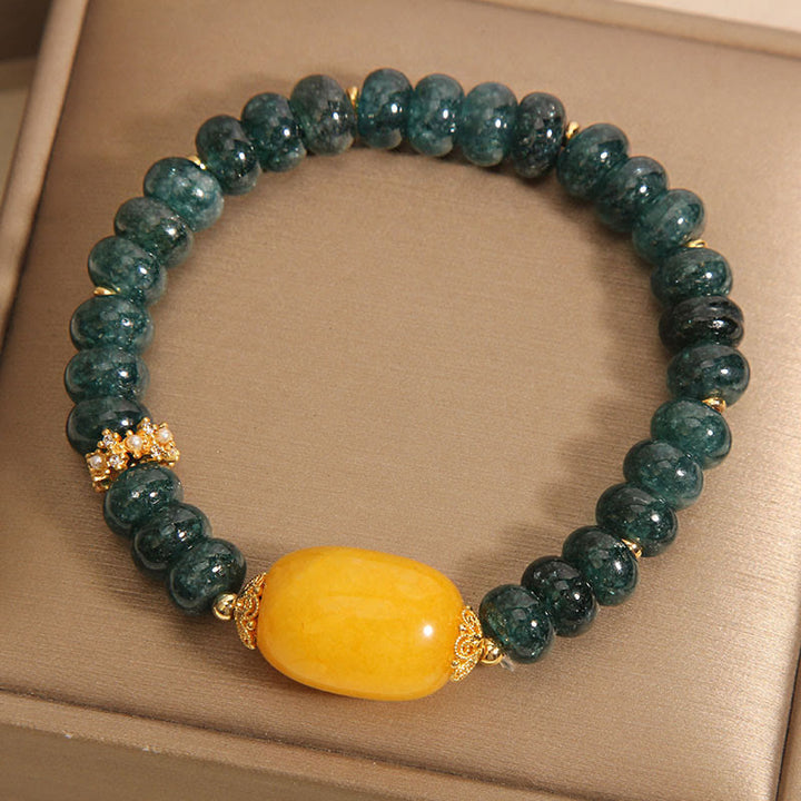 Bracelet porte-bonheur en Buddha Stones, perles de boulier en jade vert et topaze