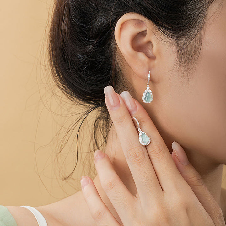 Boucles d'oreilles pendantes en argent sterling 925 avec Buddha Stones et jade vert