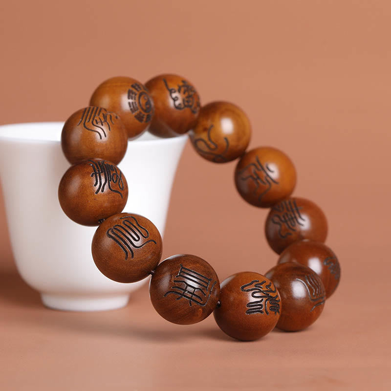 Bracelet porte-bonheur gravé Buddha Stones et bois de jujubier frappé par la foudre Yin Yang Bagua Symbole des écritures taboues taoïstes