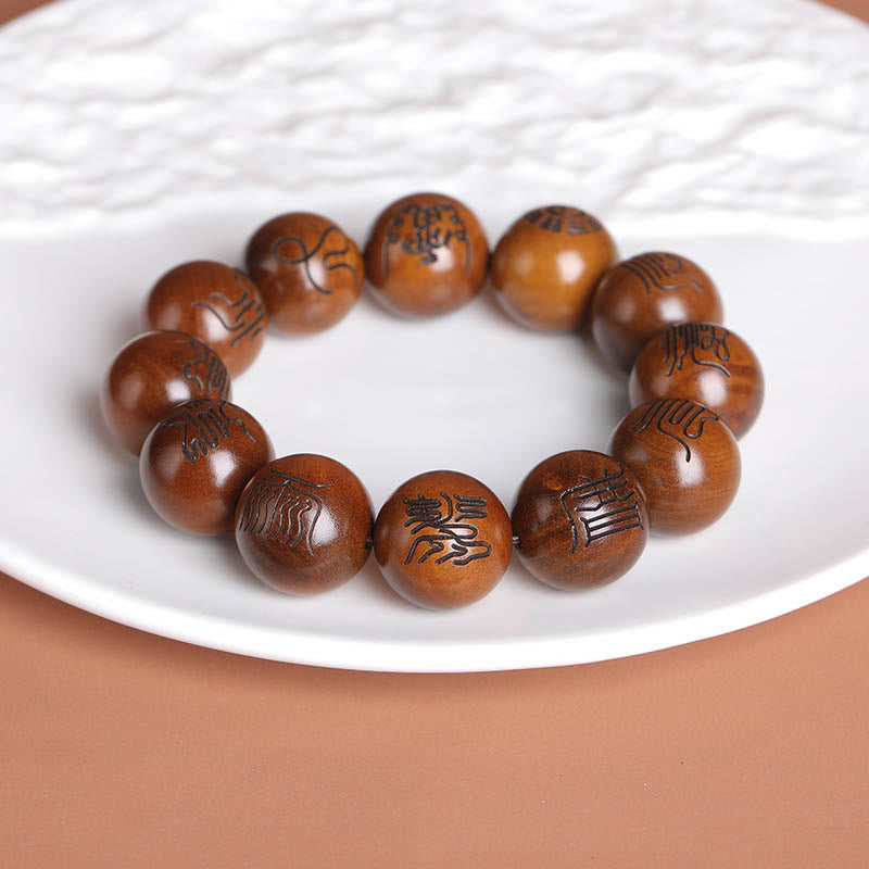 Bracelet porte-bonheur gravé Buddha Stones et bois de jujubier frappé par la foudre Yin Yang Bagua Symbole des écritures taboues taoïstes