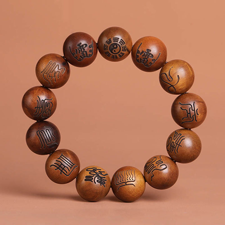 Bracelet porte-bonheur gravé Buddha Stones et bois de jujubier frappé par la foudre Yin Yang Bagua Symbole des écritures taboues taoïstes