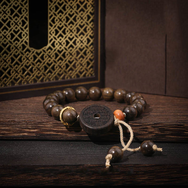 Bracelet d'équilibre en Buddha Stones et bois d'ébène avec fantômes des montagnes