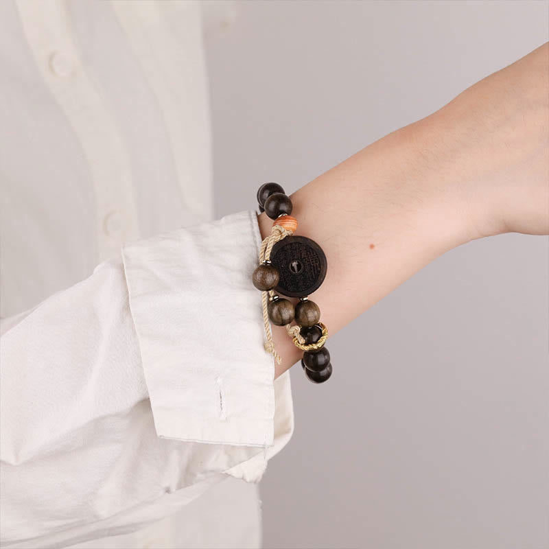 Bracelet d'équilibre en Buddha Stones et bois d'ébène avec fantômes des montagnes