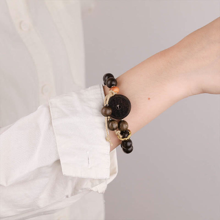 Bracelet d'équilibre en Buddha Stones et bois d'ébène avec fantômes des montagnes