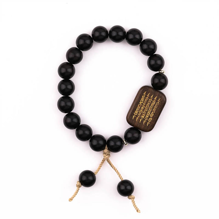 Bracelet de paix gravé en bois d'ébène avec Buddha Stones