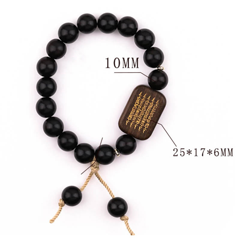 Bracelet de paix gravé en bois d'ébène avec Buddha Stones