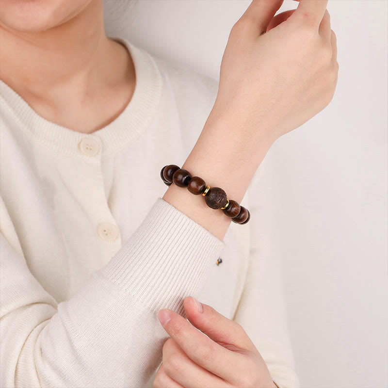 Bracelet de compassion en bois de rose naturel Buddha Stones