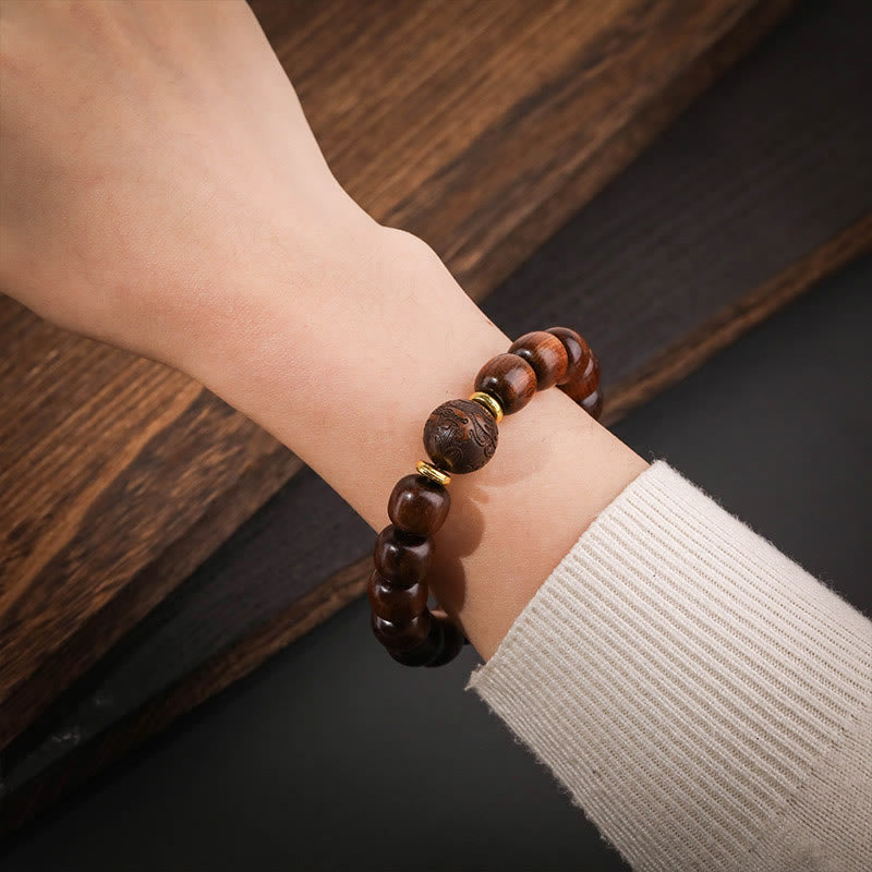 Bracelet de compassion en bois de rose naturel Buddha Stones