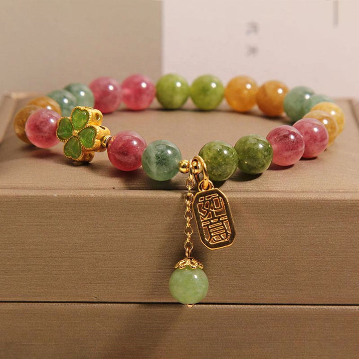 Bracelet positif en trèfle à quatre feuilles coloré en jade tourmaline et Buddha Stones