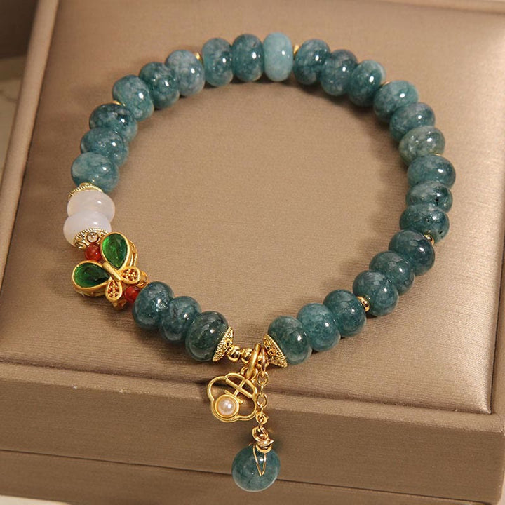 Bracelet d'abondance en Buddha Stones de boulier papillon en jade et agate blanche