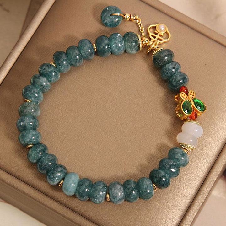 Bracelet d'abondance en Buddha Stones de boulier papillon en jade et agate blanche