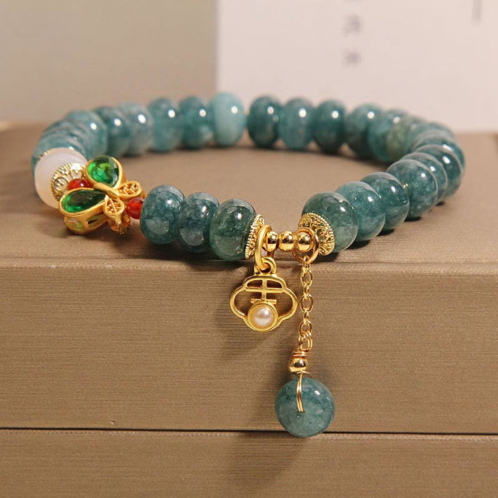 Bracelet d'abondance en Buddha Stones de boulier papillon en jade et agate blanche