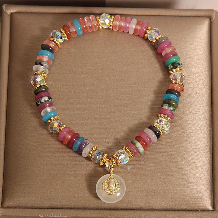 Bracelet de bon augure avec boucle de paix en quartz fraise et Buddha Stones