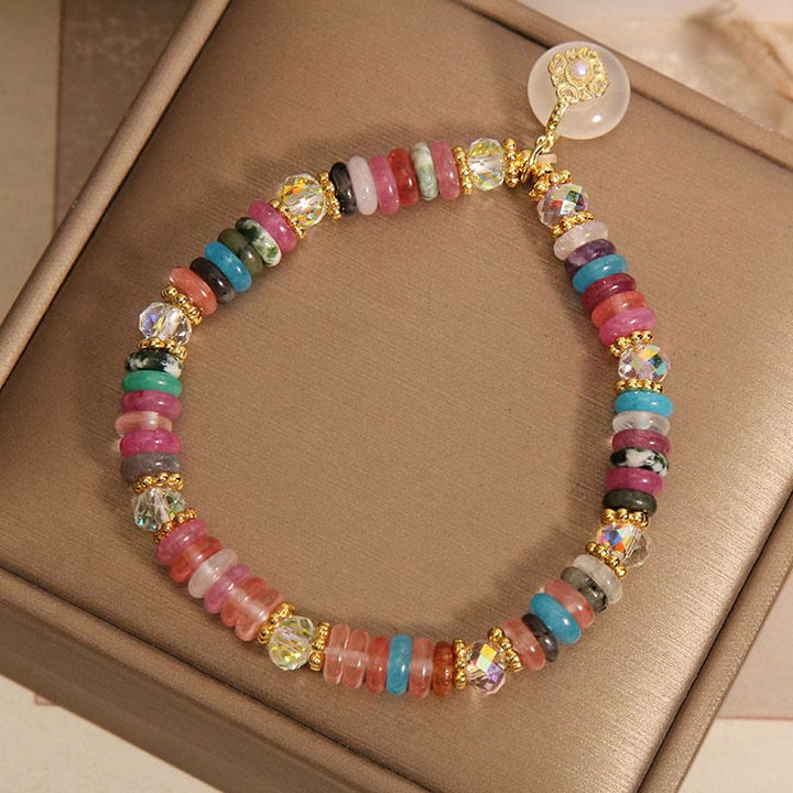 Bracelet de bon augure avec boucle de paix en quartz fraise et Buddha Stones