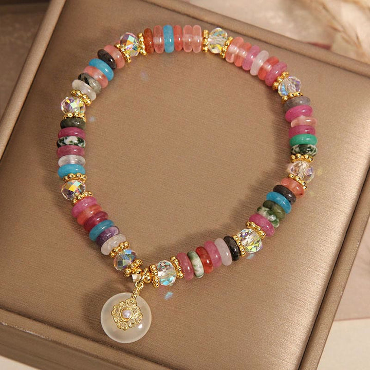 Bracelet de bon augure avec boucle de paix en quartz fraise et Buddha Stones