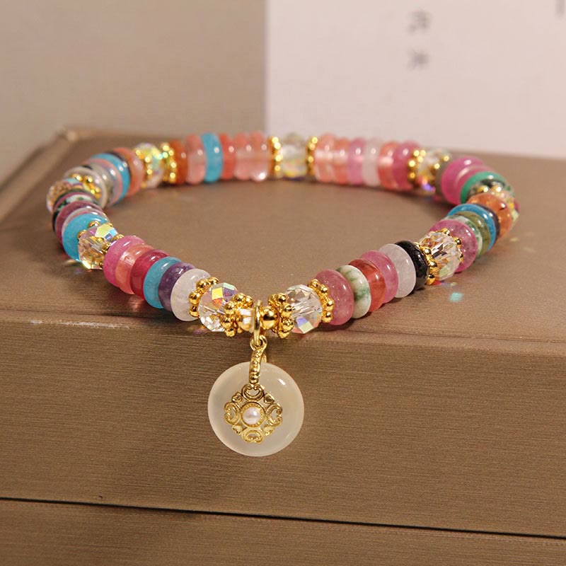 Bracelet de bon augure avec boucle de paix en quartz fraise et Buddha Stones