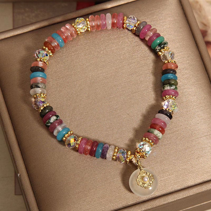 Bracelet de bon augure avec boucle de paix en quartz fraise et Buddha Stones