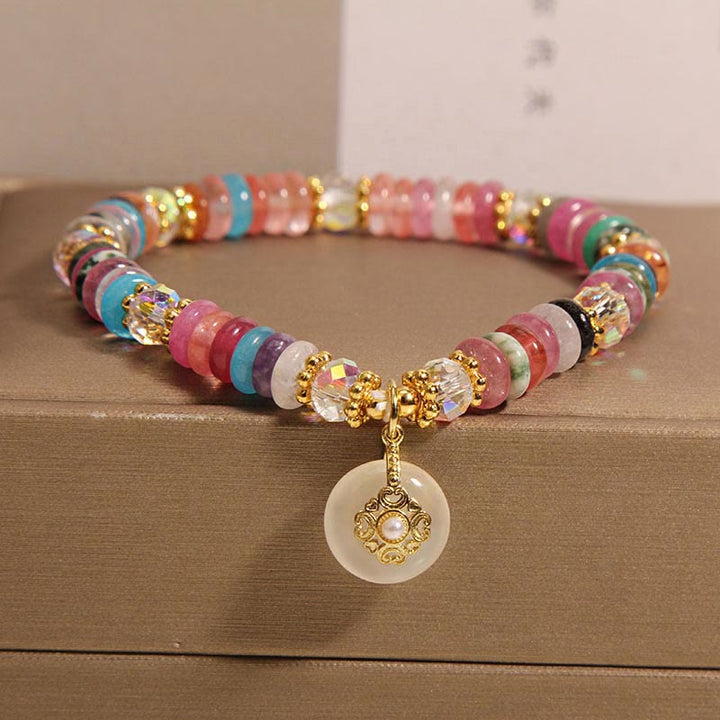 Bracelet de bon augure avec boucle de paix en quartz fraise et Buddha Stones