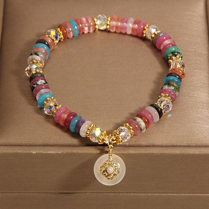 Bracelet de bon augure avec boucle de paix en quartz fraise et Buddha Stones