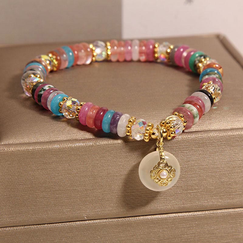 Bracelet de bon augure avec boucle de paix en quartz fraise et Buddha Stones