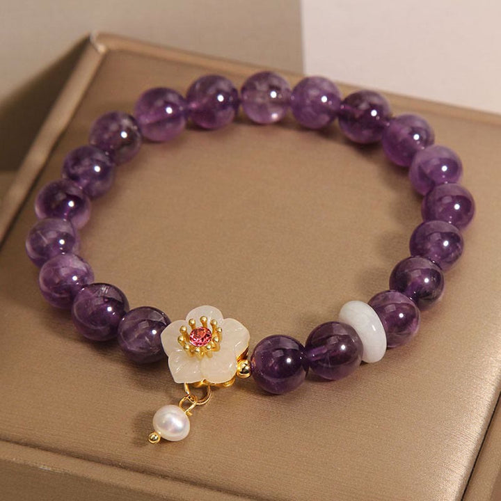 Bracelet d'équilibre avec breloque en perles d'agate blanche et améthyste naturelle de Buddha Stones