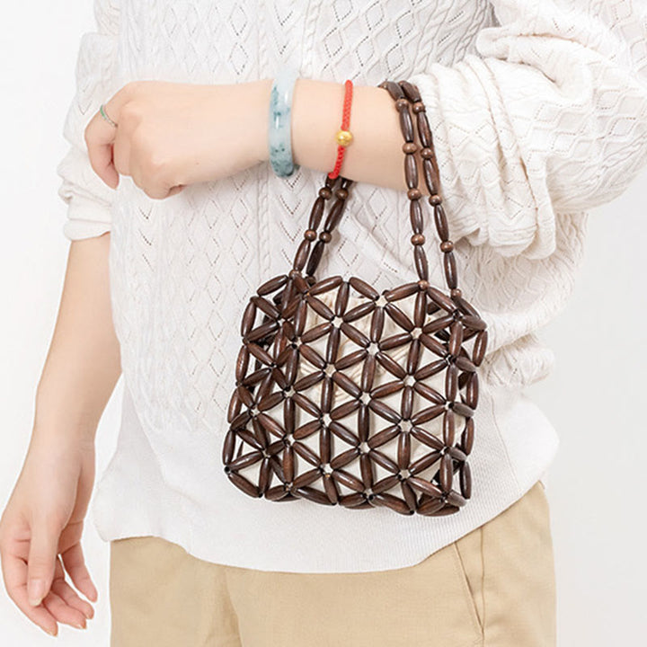 Sac à main en mini perles en bois tissées à la main Buddha Stones